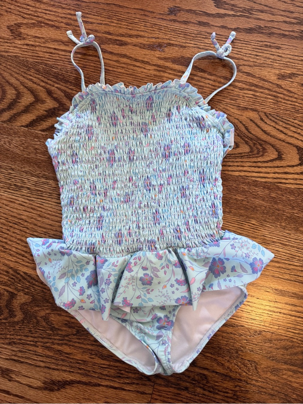 Ruffle Butts Light Blue Floral Smocked One-Piece Swimsuit